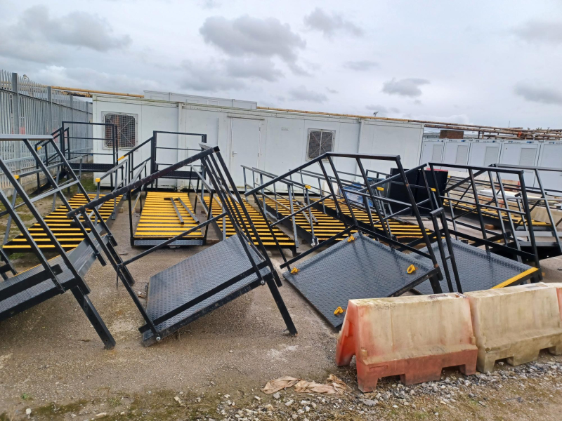 Steel handrails in workshop yard